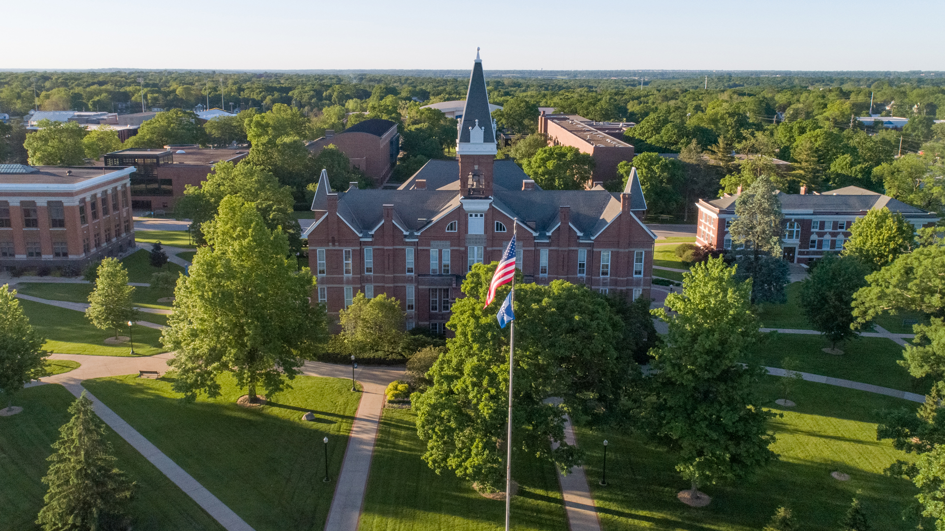 An aerial view of campus buildings and gathering spaces