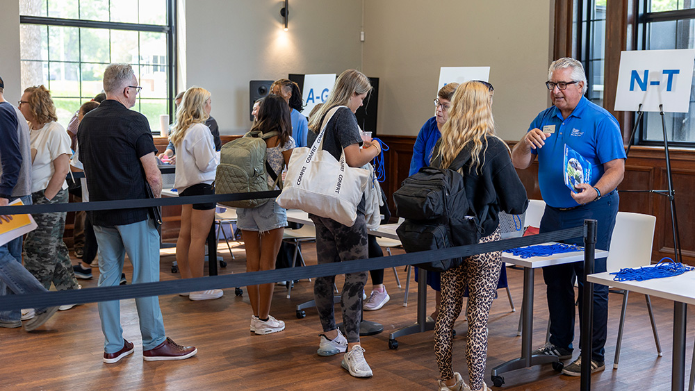 Students checking in for Summer Orientation at the Johansen Student Center.