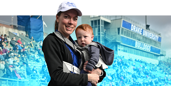 Mother and baby standing on the Blue Oval