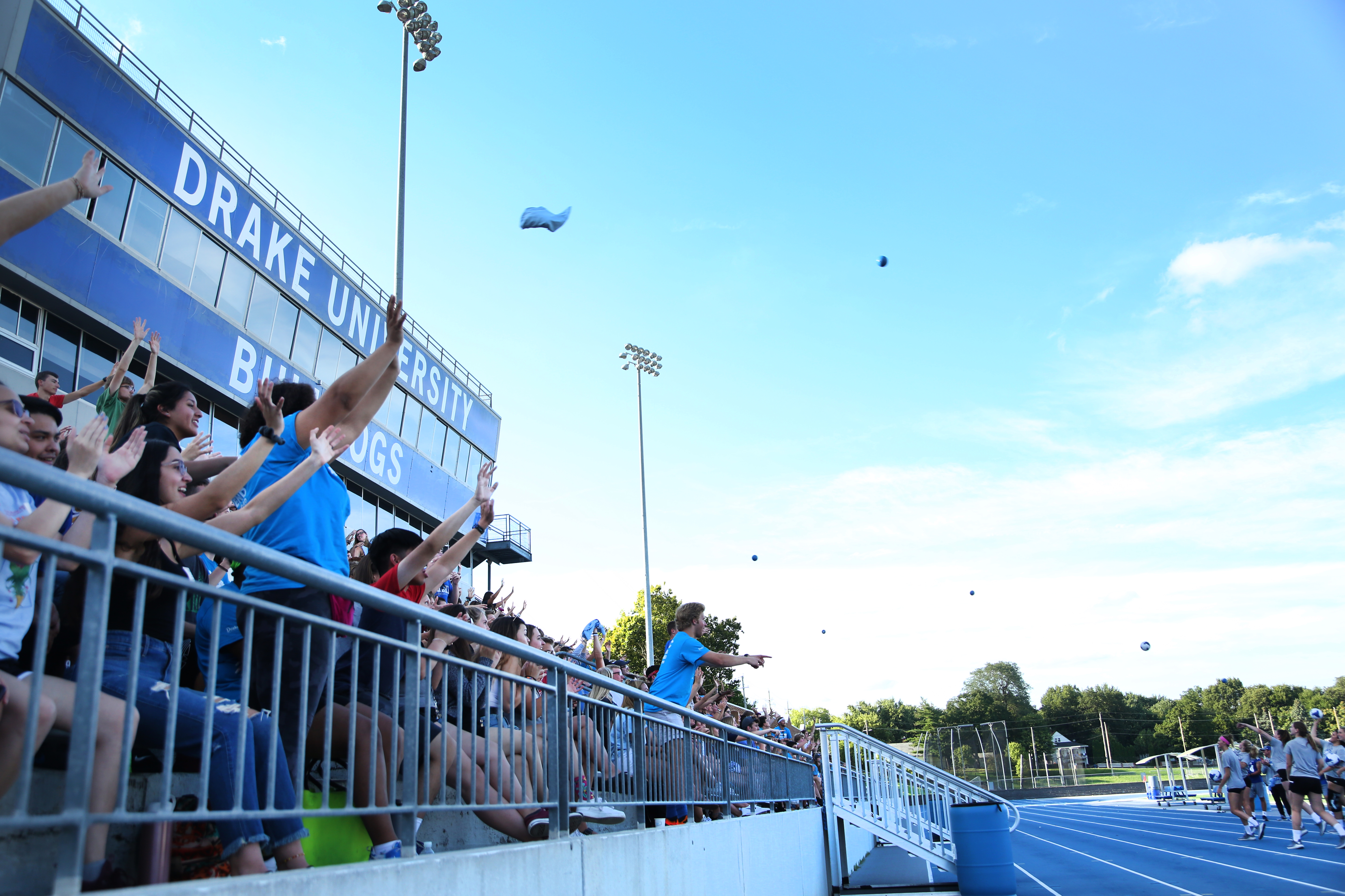 Students enjoying a pep rally at the football stadium during Welcome Weekend