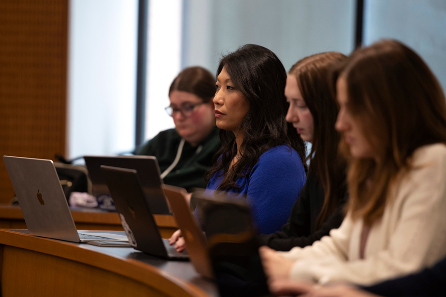 Arts and Sciences students participating in the 3+3 Law program take notes on their laptops during class