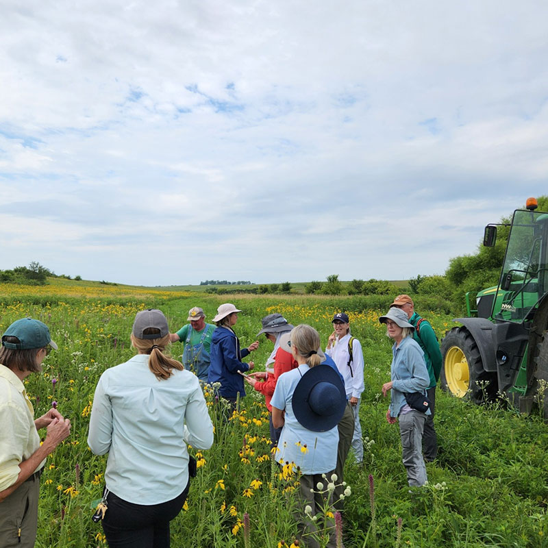 Group of individuals touring the Dunn Ranch.